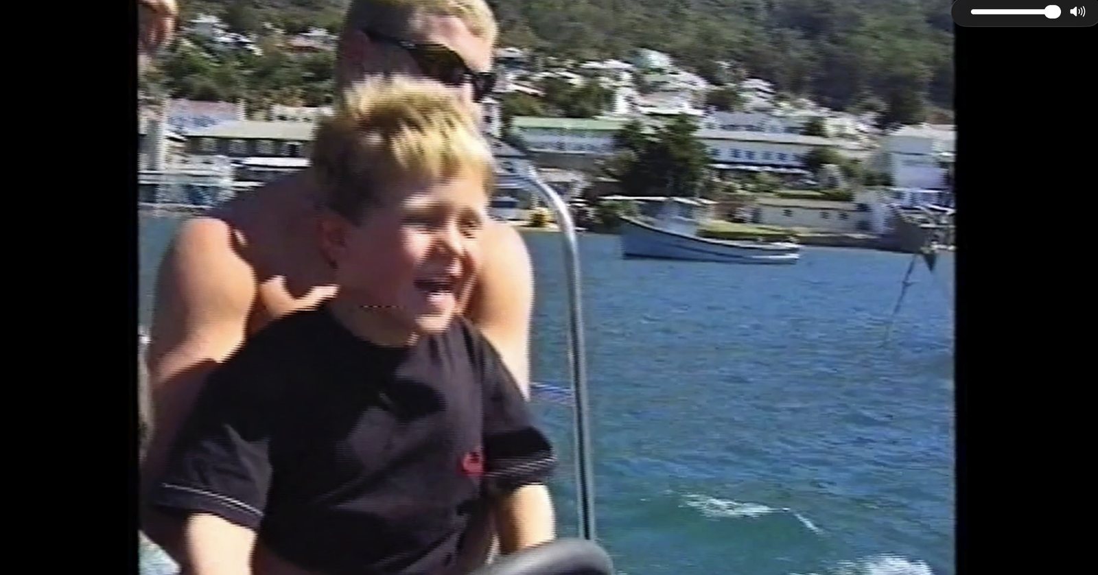 Chris laughing on a navy boat in Simonstown harbour